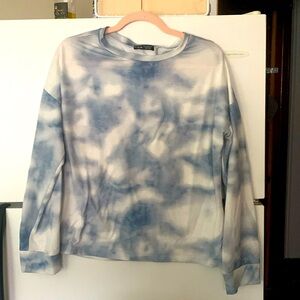 Two-piece pajama set. Both long sleeve shirt and pants are women’s size large.